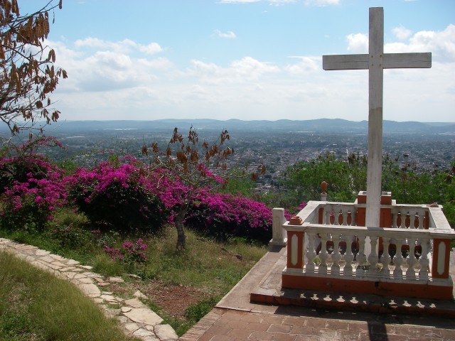 The cross at the top.